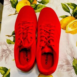 Featuring the iconic Adidas brand, these sneakers are not just limited